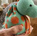 Dino Backpack Amigurumi Pattern step 3 - details and accessories