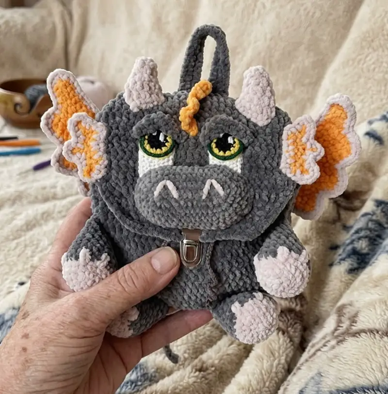Quality crochet pattern: Baby Dino Backpack Amigurumi Pattern - Intermediate level guide with complete instructions